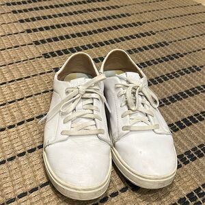 OluKai white tennis shoes